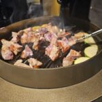 Poongro at Jeju Shinhwa World with Grilled Black Pork Belly